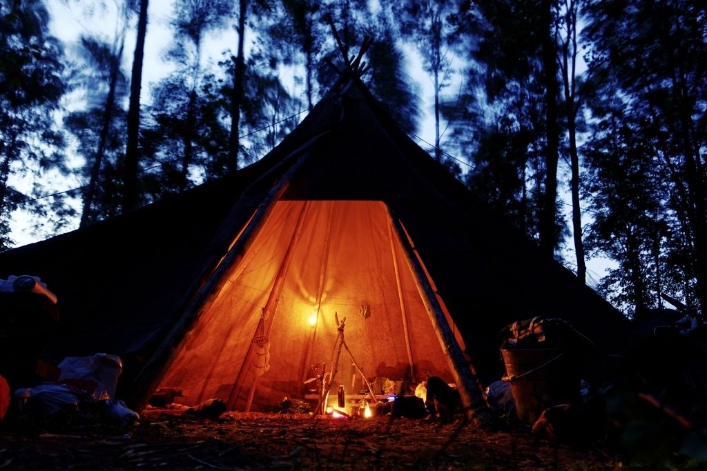Similar to camping, setting up a tipi is such a fun backyard idea for kids. They will love spending time in their fort.